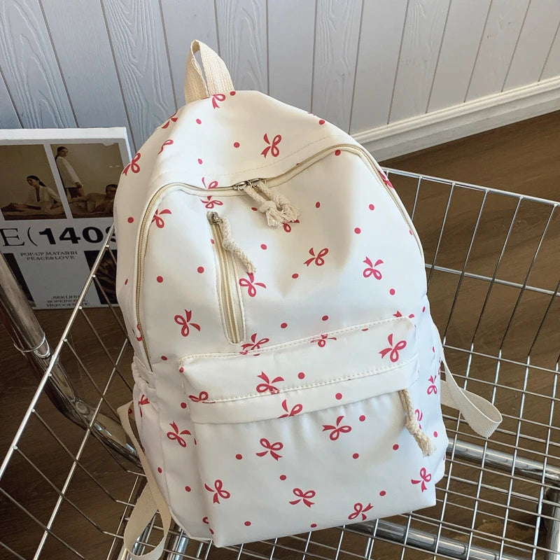 Para uso diario, temporada de regreso a la escuela, mochila acolchada con estampado de lazos divertidos, con múltiples bolsillos, correas ajustables, gran capacidad