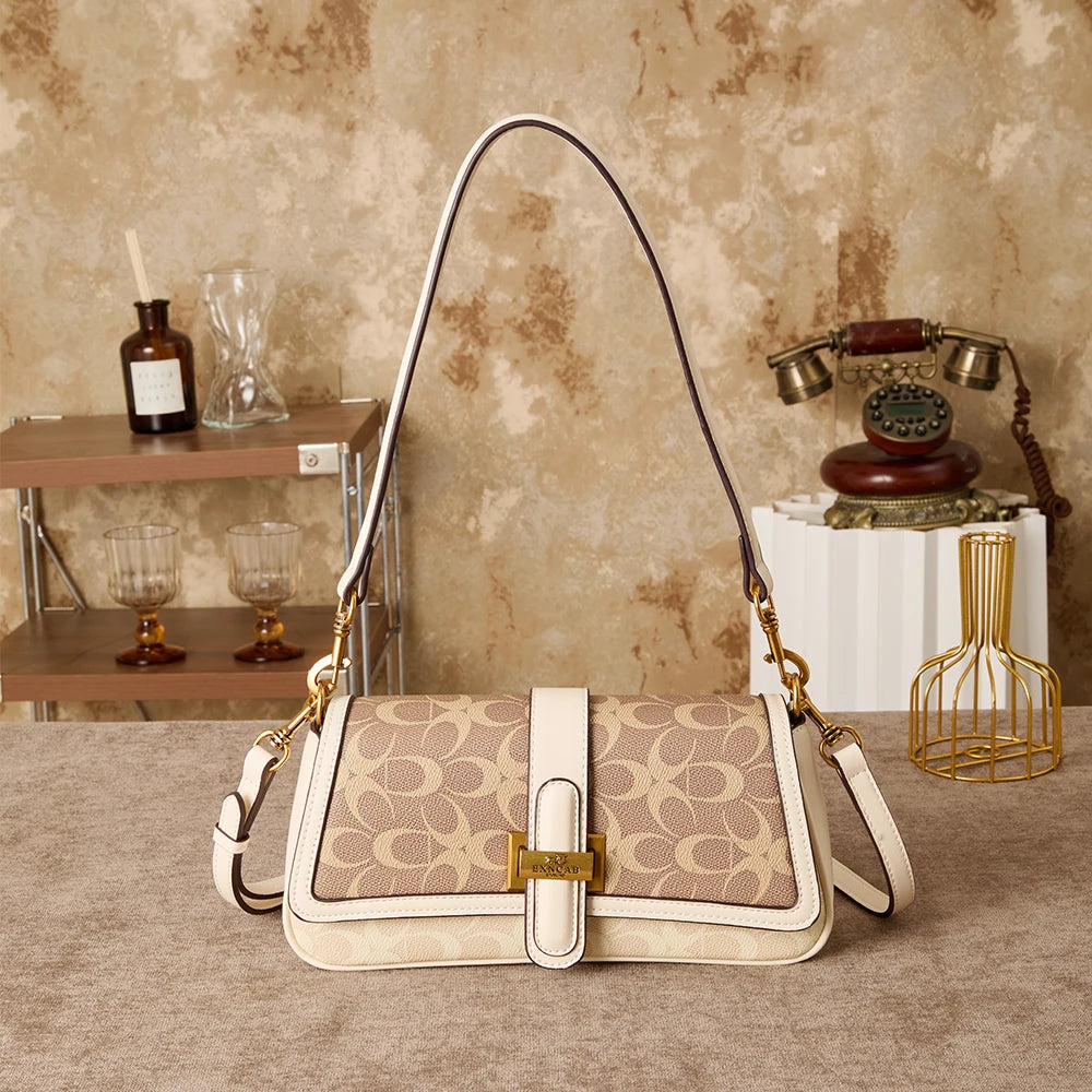 Bolso de mano para mujer 2026, nuevo diseño de nicho a la moda, bolso retro de hombro, ideal para el día a día, con bandolera de lujo ligero de alta gama.
