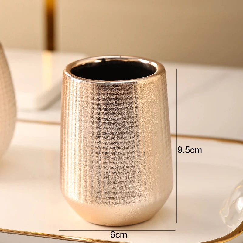 Botella de loción de cerámica de oro rosa, taza de enjuague bucal, soporte para cepillo de dientes, juego de accesorios de baño para el hogar, champú, botella de lavado corporal, jabonera