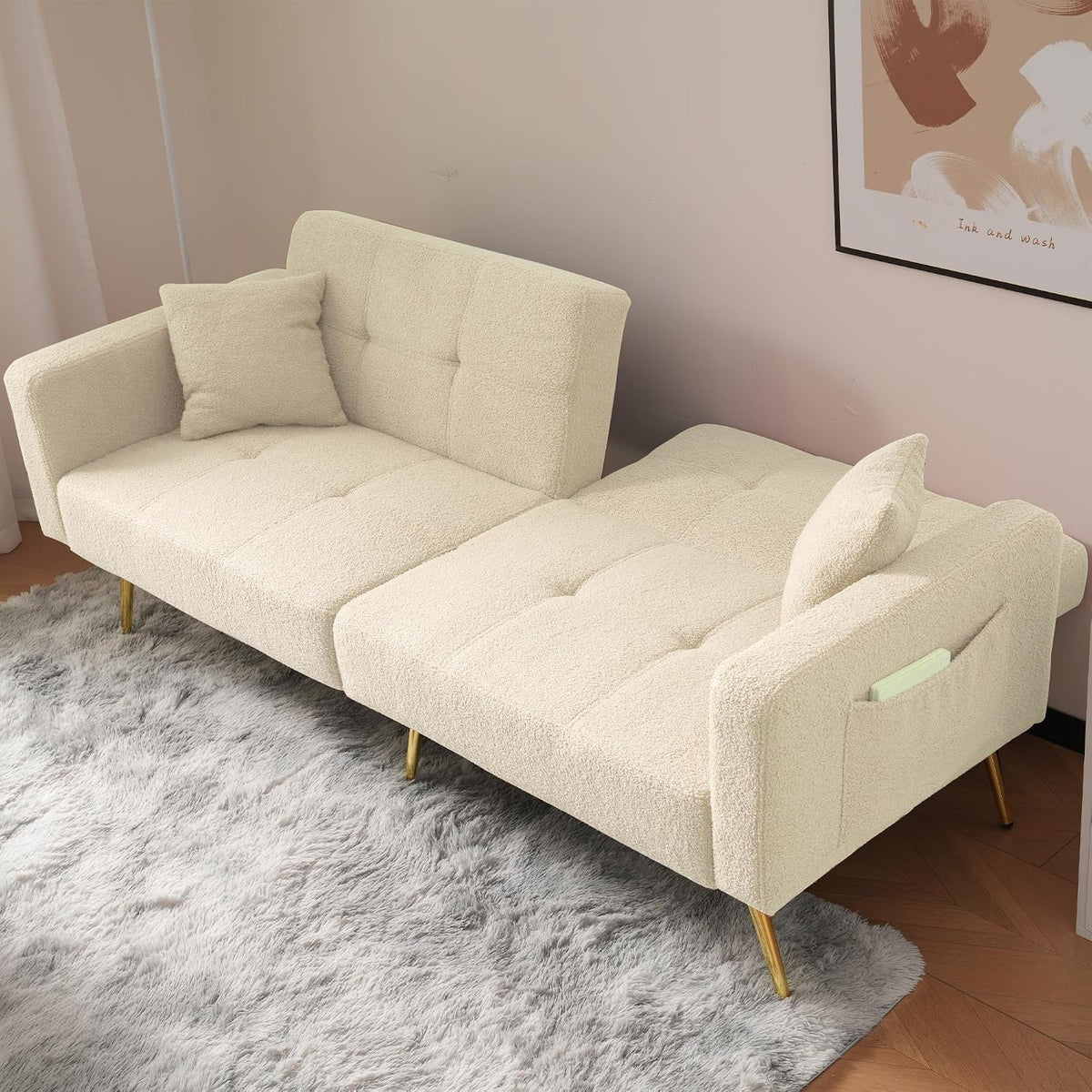 Sofá cama con esquinas ajustables, patas doradas, almohadas y bolsillos laterales para almacenamiento (Bavia)