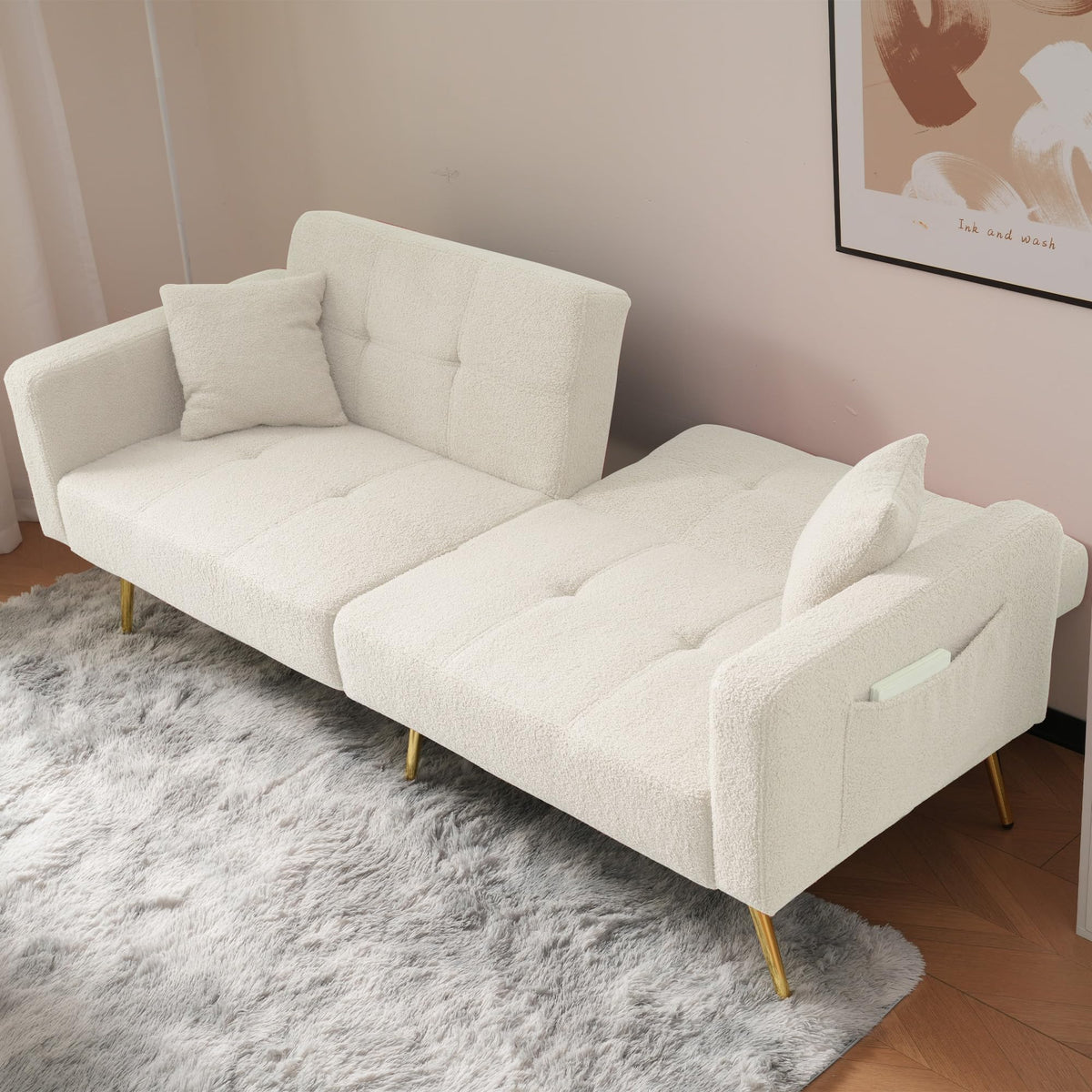 Sofá cama con esquinas ajustables, patas doradas, almohadas y bolsillos laterales para almacenamiento (Bavia)