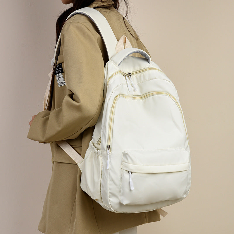 Autumn and Winter 2024 New Backpack Men's and Women's Large Capacity Commuter Travel Backpack Leisure Bag Student Junior Senior high school Schoolbag