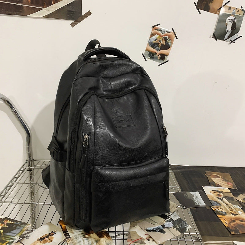 New soft leather retro men's and women's shoulder bag high school students college students large capacity schoolbag trendy cool all-match backpack wholesale