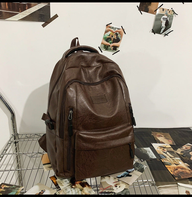 New soft leather retro men's and women's shoulder bag high school students college students large capacity schoolbag trendy cool all-match backpack wholesale