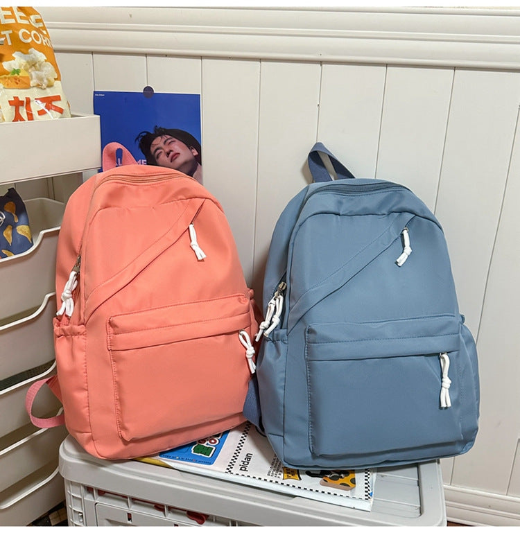 New Large Capacity Primary School Junior High School Students' Casual Schoolbag Japanese Style Fashion Simple Solid Color Travel Backpack