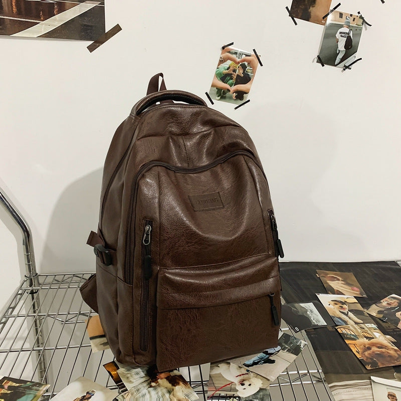 New soft leather retro men's and women's shoulder bag high school students college students large capacity schoolbag trendy cool all-match backpack wholesale