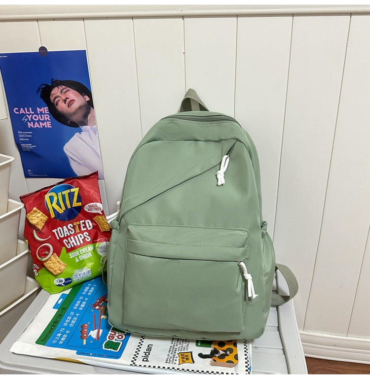 New Large Capacity Primary School Junior High School Students' Casual Schoolbag Japanese Style Fashion Simple Solid Color Travel Backpack