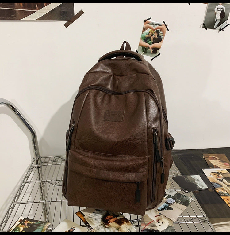 New soft leather retro men's and women's shoulder bag high school students college students large capacity schoolbag trendy cool all-match backpack wholesale