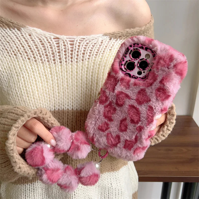 Funda de teléfono con soporte de lente de felpa peluda de leopardo a la moda para iPhone 17Air 15 14 13 12 11 16 Pro Max con cubierta a prueba de golpes con cadena para la muñeca