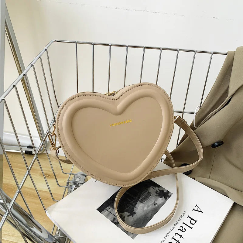 Gran oferta de bolsos cruzados con forma de corazón para mujer, bandoleras de piel sintética sólidas, bolsos de moda