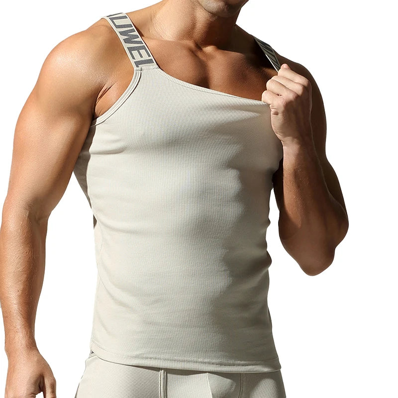 Camisetas sin mangas a la moda para hombre, chaleco deportivo de entrenamiento sin mangas, camisolas acanaladas con tirantes elásticos de Color sólido, camisetas interiores ajustadas