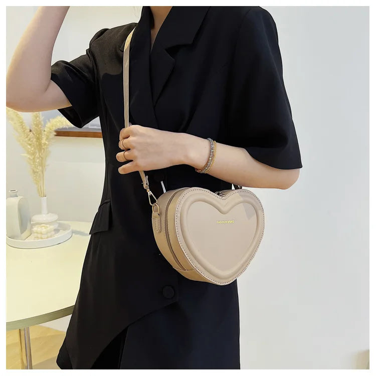 Gran oferta de bolsos cruzados con forma de corazón para mujer, bandoleras de piel sintética sólidas, bolsos de moda