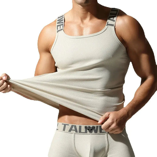 Camisetas sin mangas a la moda para hombre, chaleco deportivo de entrenamiento sin mangas, camisolas acanaladas con tirantes elásticos de Color sólido, camisetas interiores ajustadas