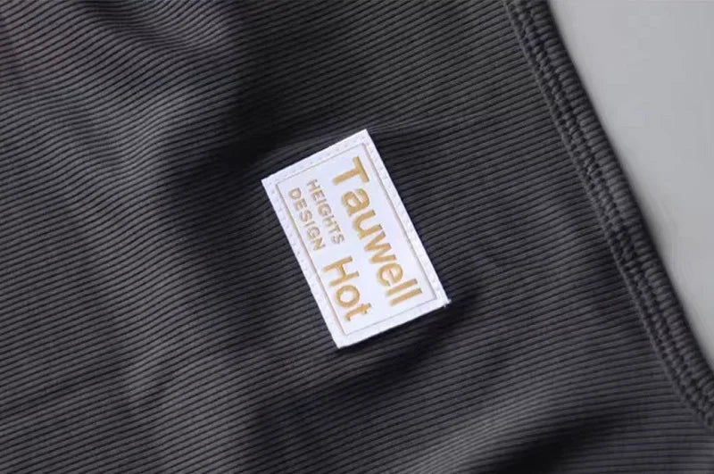Camisetas sin mangas a la moda para hombre, chaleco deportivo de entrenamiento sin mangas, camisolas acanaladas con tirantes elásticos de Color sólido, camisetas interiores ajustadas