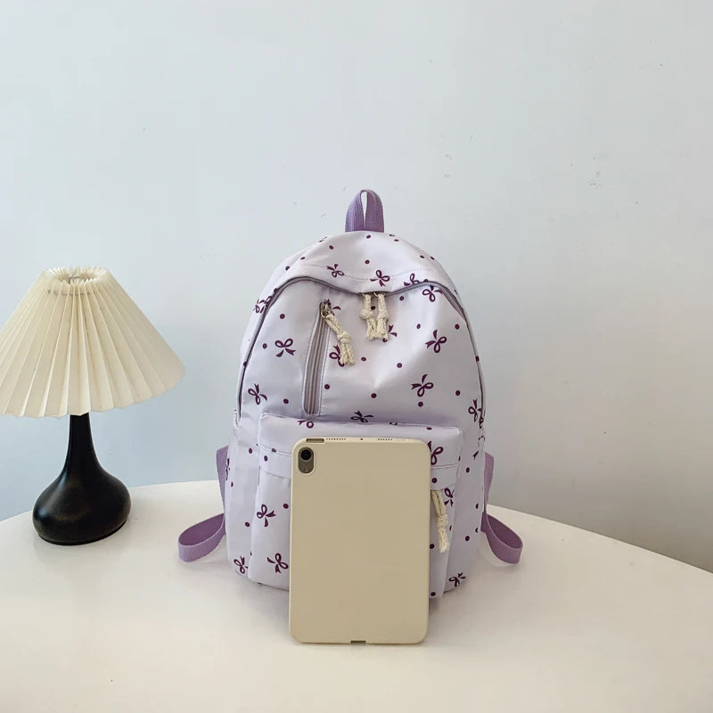 Para uso diario, temporada de regreso a la escuela, mochila acolchada con estampado de lazos divertidos, con múltiples bolsillos, correas ajustables, gran capacidad