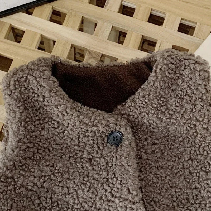 Otoño Invierno bebé lana de cordero más chaleco de terciopelo niñas niños chaleco de felpa de un solo pecho cuello en V niño cálido moda abrigo cálido