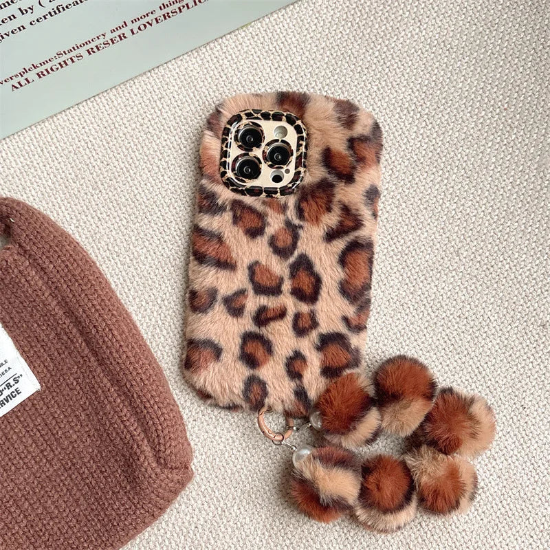 Funda de teléfono con soporte de lente de felpa peluda de leopardo a la moda para iPhone 17Air 15 14 13 12 11 16 Pro Max con cubierta a prueba de golpes con cadena para la muñeca
