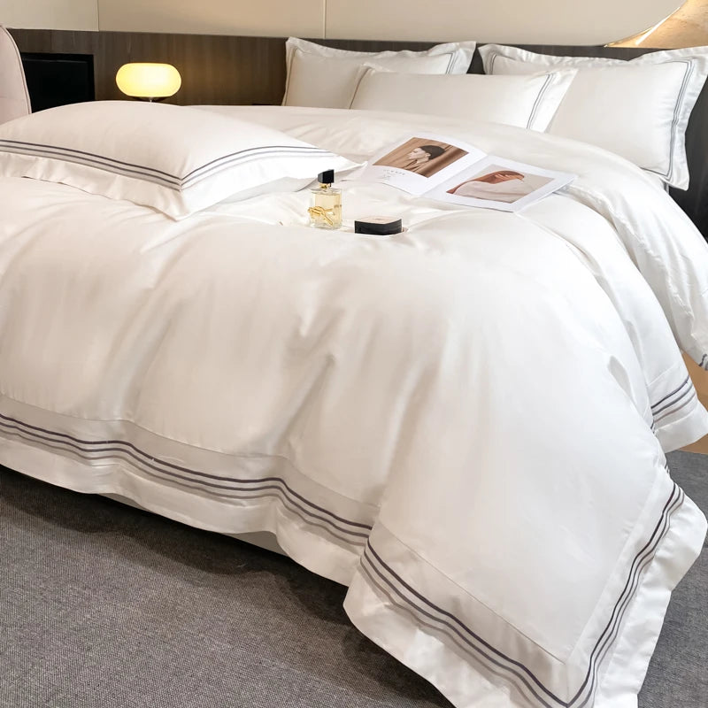Juego de ropa de cama de lujo para Hotel, funda de edredón con bordado de Color sólido, Sábana plana/ajustada, fundas de almohada, tamaño Queen y King, 100% algodón