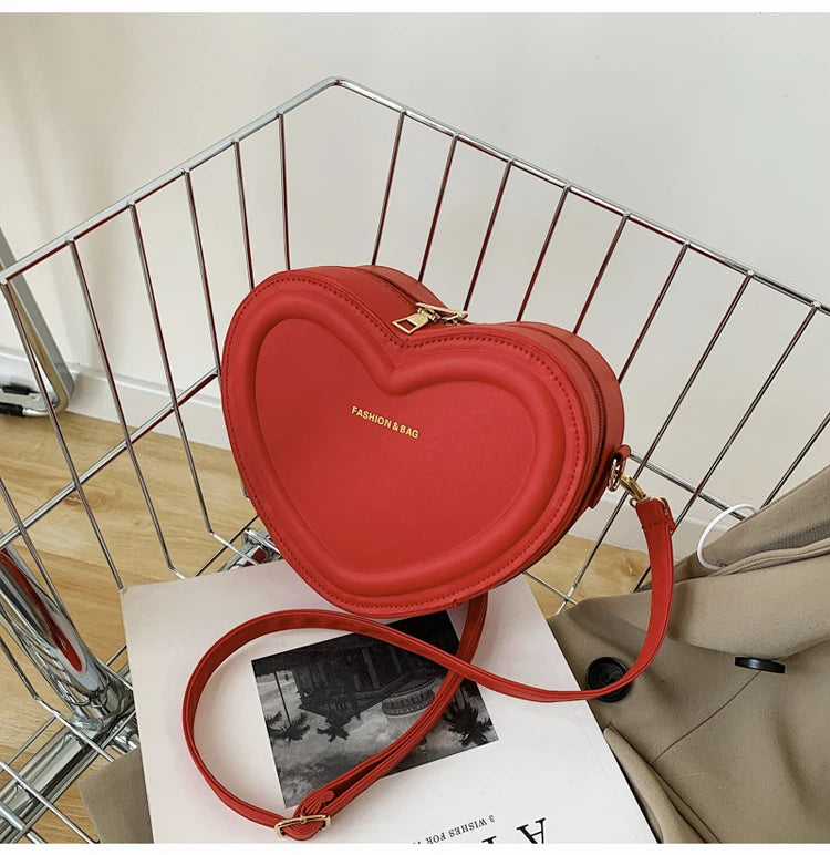 Gran oferta de bolsos cruzados con forma de corazón para mujer, bandoleras de piel sintética sólidas, bolsos de moda