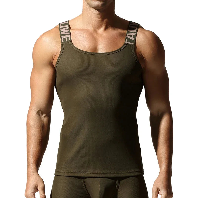 Camisetas sin mangas a la moda para hombre, chaleco deportivo de entrenamiento sin mangas, camisolas acanaladas con tirantes elásticos de Color sólido, camisetas interiores ajustadas