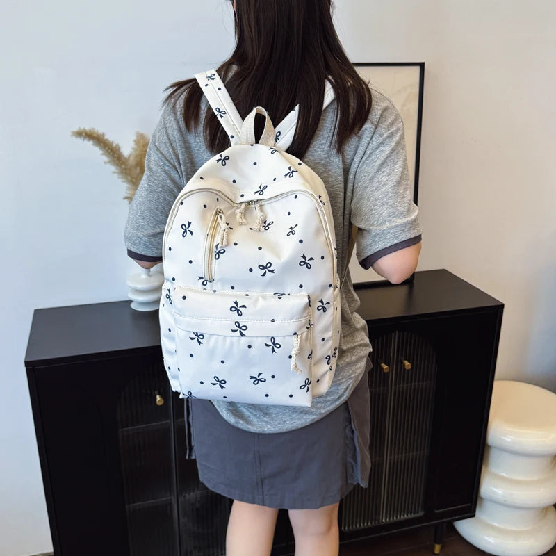 Para uso diario, temporada de regreso a la escuela, mochila acolchada con estampado de lazos divertidos, con múltiples bolsillos, correas ajustables, gran capacidad