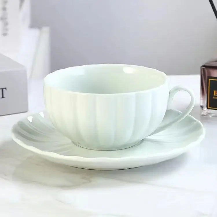 Taza de café de calabaza creativa para colgar en la oreja, nuevo juego de Taza y plato de cerámica, diseño pequeño Sense Home Fairy Taza y plato