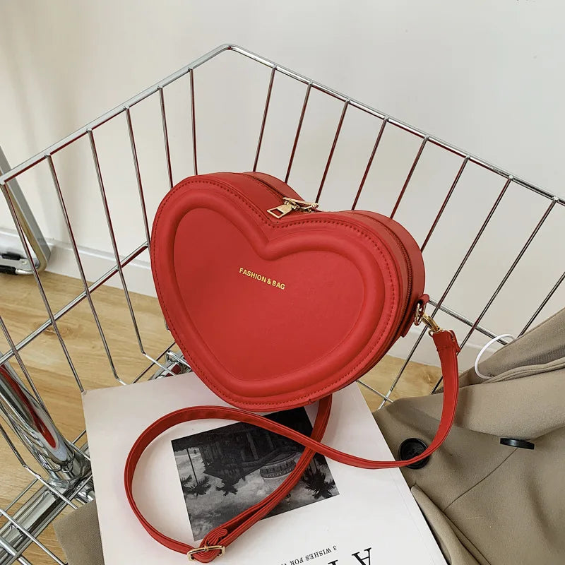 Gran oferta de bolsos cruzados con forma de corazón para mujer, bandoleras de piel sintética sólidas, bolsos de moda