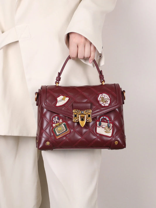 2026 nueva moda impresa bolso de remache personalizado con alto sentido de lujo y contraste retro, bolso de mensajero de un solo hombro ingenio