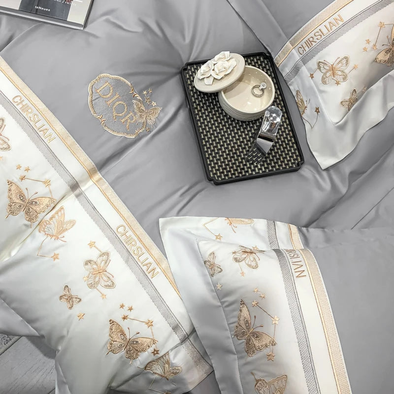 Juego de cama 100% de algodón, edredón bordado de mariposa dorada de lujo/funda nórdica, juegos de sábanas ajustadas, fundas de almohada, textiles para el hogar