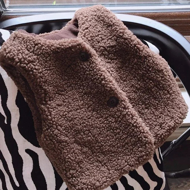 Otoño Invierno bebé lana de cordero más chaleco de terciopelo niñas niños chaleco de felpa de un solo pecho cuello en V niño cálido moda abrigo cálido