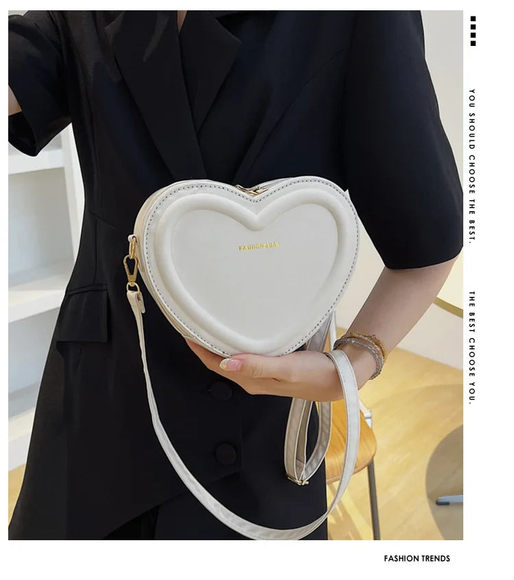Gran oferta de bolsos cruzados con forma de corazón para mujer, bandoleras de piel sintética sólidas, bolsos de moda