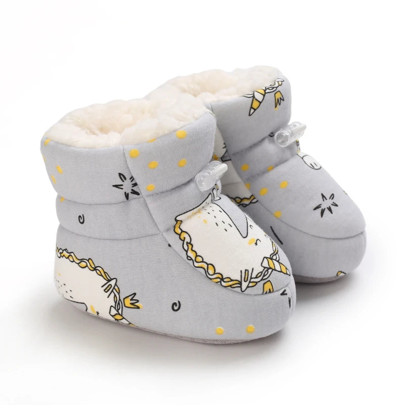Botas de invierno para bebé, suela suave de dibujos animados, zapatos cálidos antideslizantes para niños pequeños, bonitos botines para caminar para niños y niñas