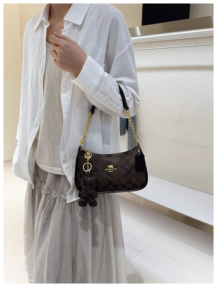 Bolso de mano de estilo de alta gama para mujer, nuevo modelo 2025, bolso cuadrado pequeño único y moderno, moderno, retro, simple y elegante, cr