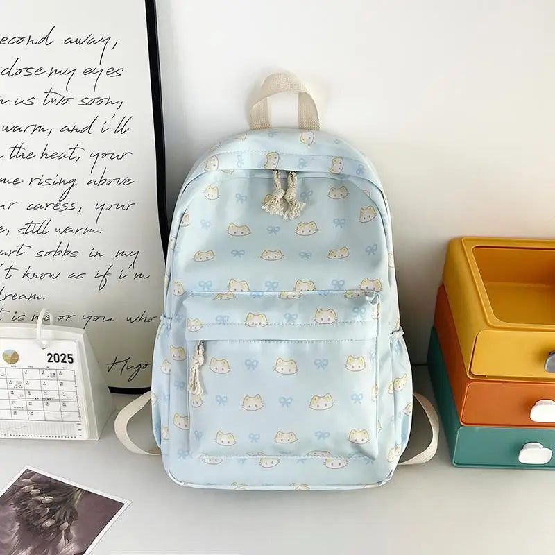 Mochila con estampado de gato de dibujos animados, mochila escolar para estudiantes de gran capacidad, bolso femenino delicado a la moda, bolsas de viaje portátiles, regalos