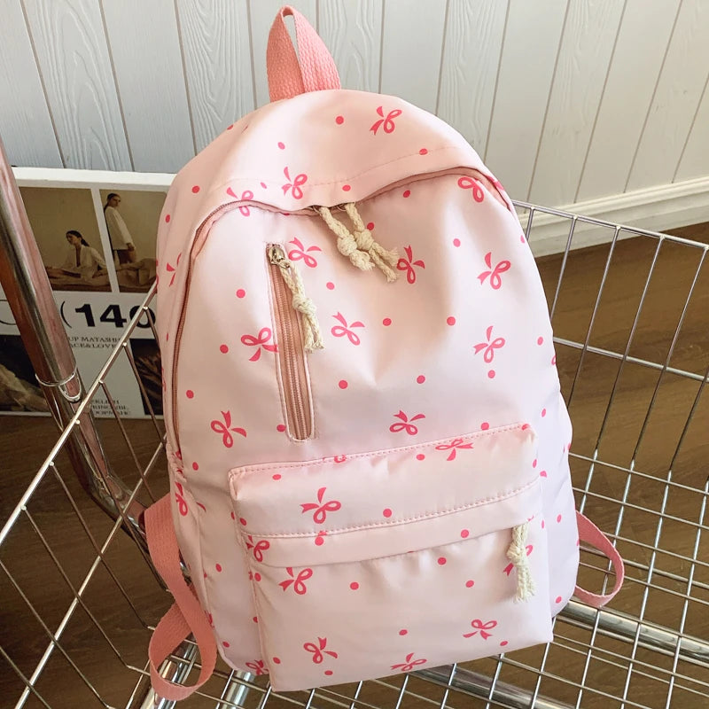Para uso diario, temporada de regreso a la escuela, mochila acolchada con estampado de lazos divertidos, con múltiples bolsillos, correas ajustables, gran capacidad