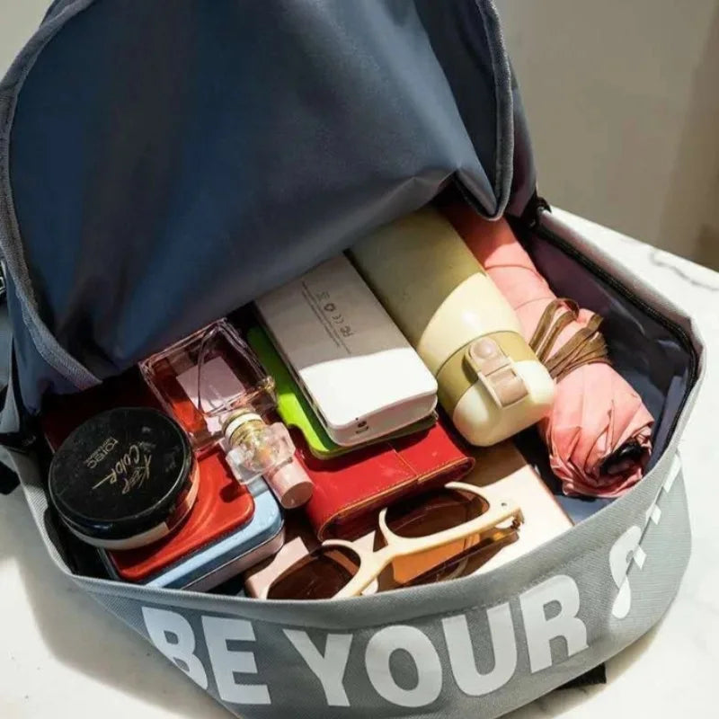Mochila de tendencia de moda para hombres y mujeres, bolsa para estudiantes de secundaria, gran capacidad, versión coreana de th