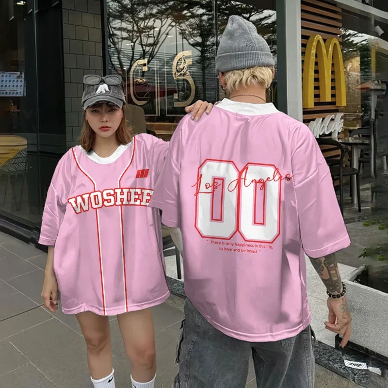 Vivodeco pink oversized short sleeve jerseys worn by a couple outside a storefront, featuring white and red lettering, a large number 10, and casual streetwear styling