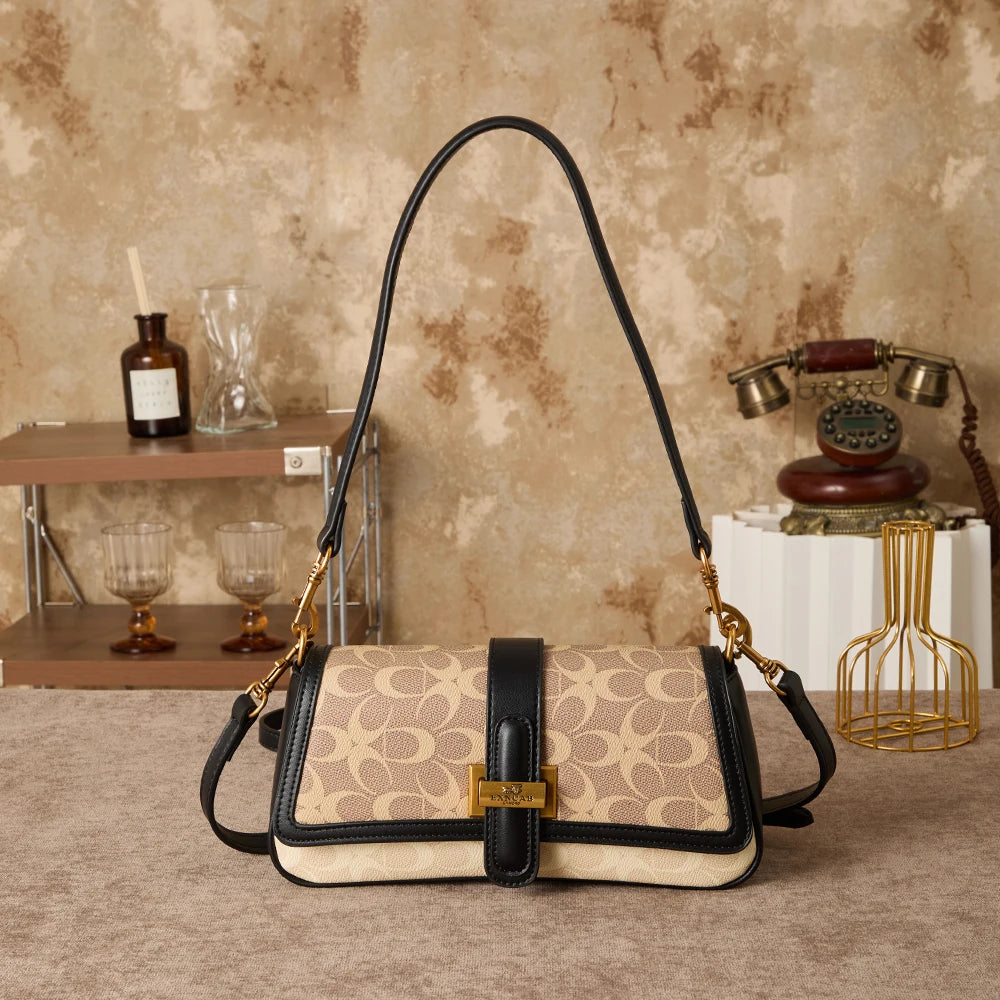 Bolso de mano para mujer 2026, nuevo diseño de nicho a la moda, bolso retro de hombro, ideal para el día a día, con bandolera de lujo ligero de alta gama.