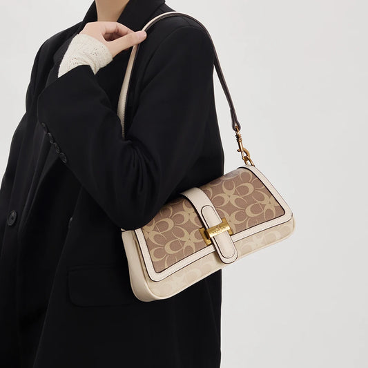 Bolso de mano para mujer 2026, nuevo diseño de nicho a la moda, bolso retro de hombro, ideal para el día a día, con bandolera de lujo ligero de alta gama.