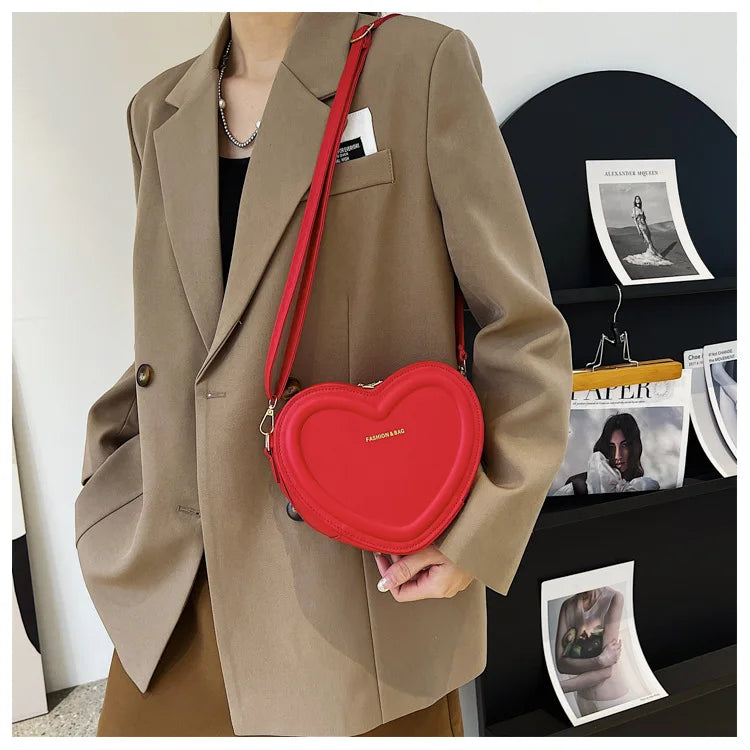 Gran oferta de bolsos cruzados con forma de corazón para mujer, bandoleras de piel sintética sólidas, bolsos de moda