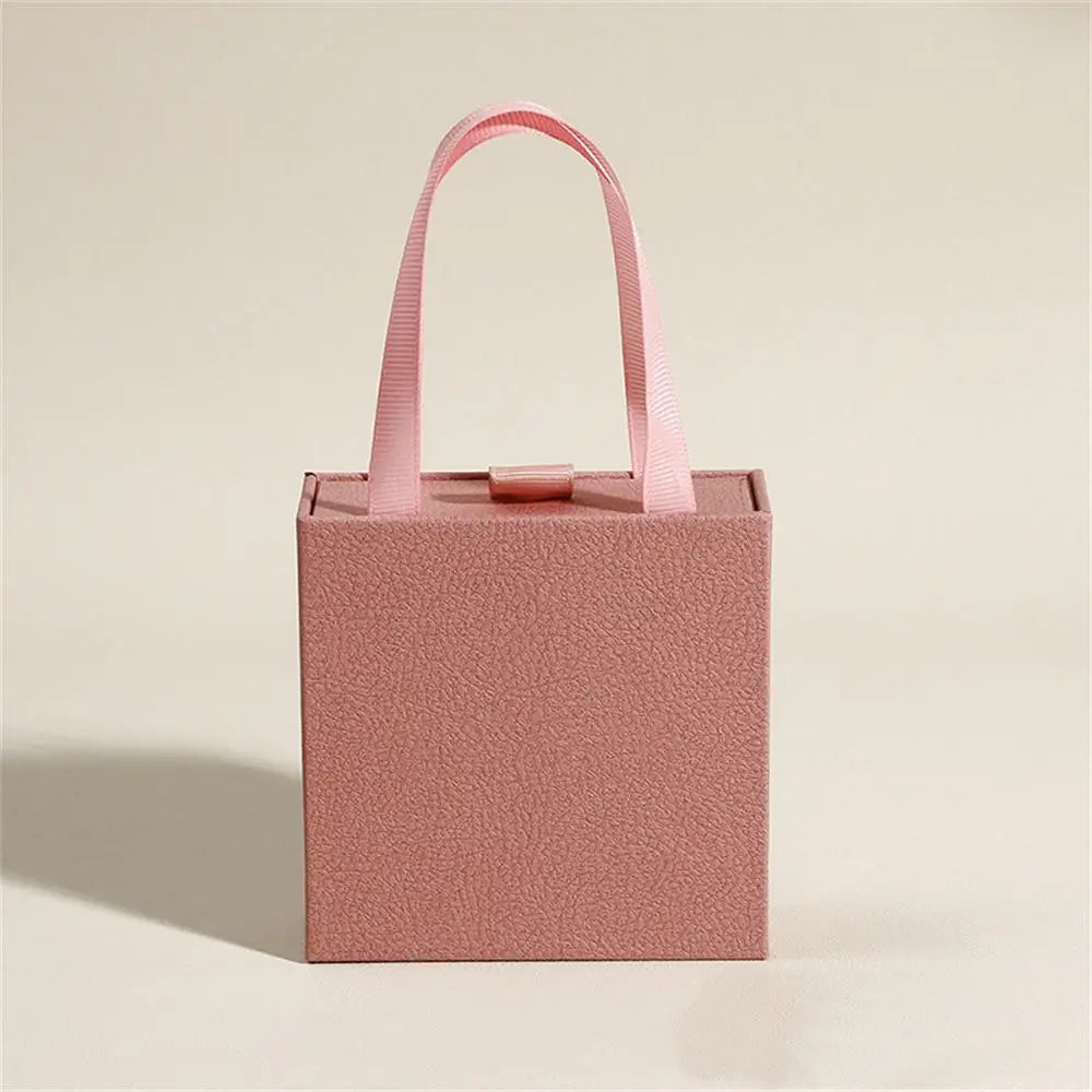 Caja de joyería tipo libro con tapa, anillo, pendientes, collar, colgante, estuche organizador, caja de embalaje de regalo de boda para el Día de San Valentín 2026