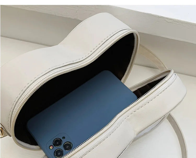 Gran oferta de bolsos cruzados con forma de corazón para mujer, bandoleras de piel sintética sólidas, bolsos de moda