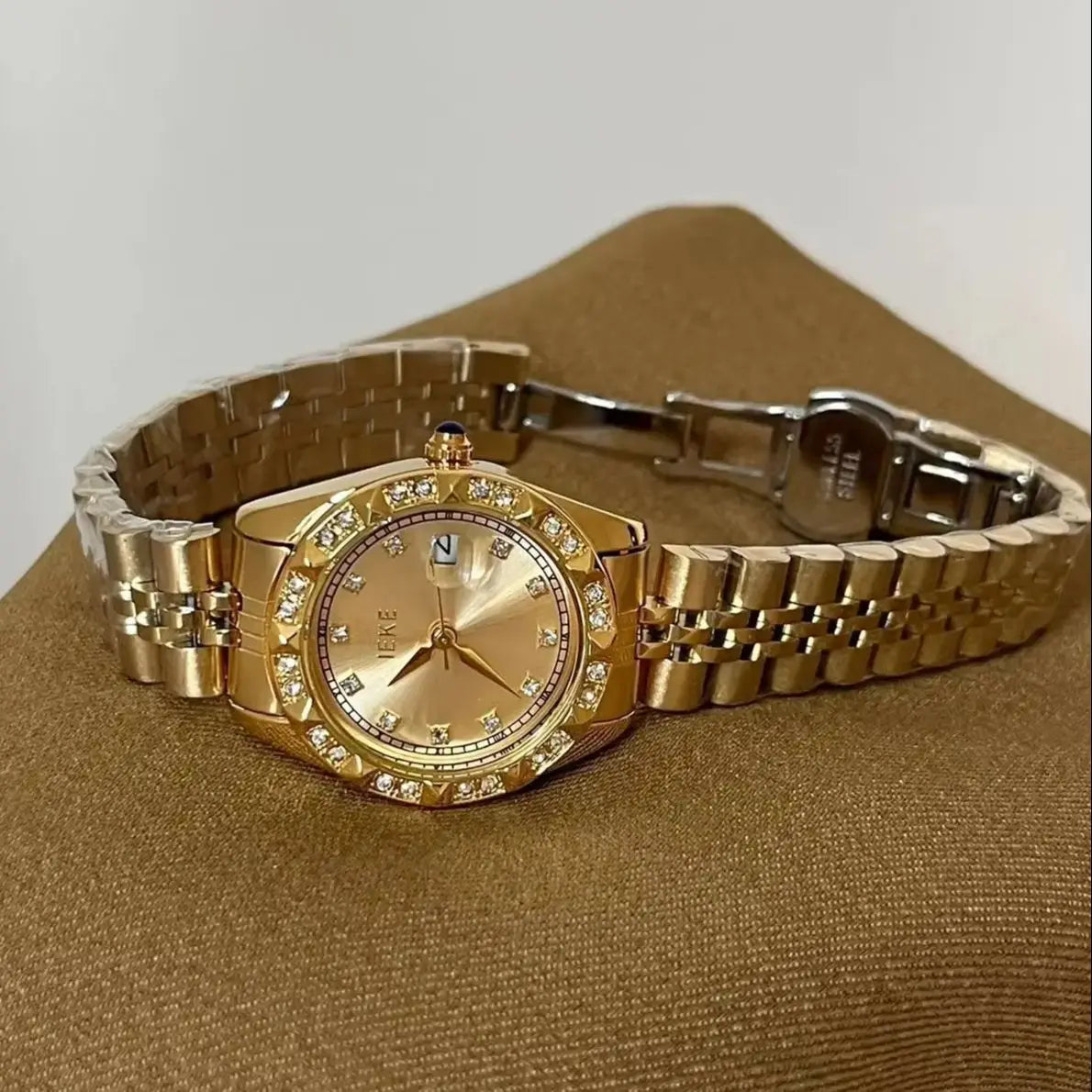Reloj con banda de acero de aleación sólida con acento de cristal para mujer, elegante vestido, relojes con calendario de cuarzo para mujer