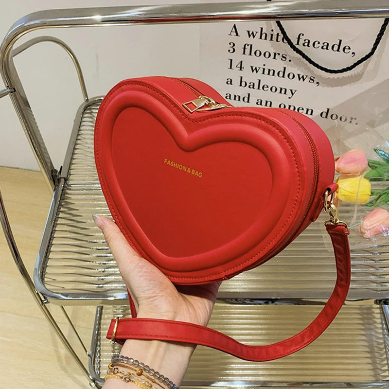 Gran oferta de bolsos cruzados con forma de corazón para mujer, bandoleras de piel sintética sólidas, bolsos de moda