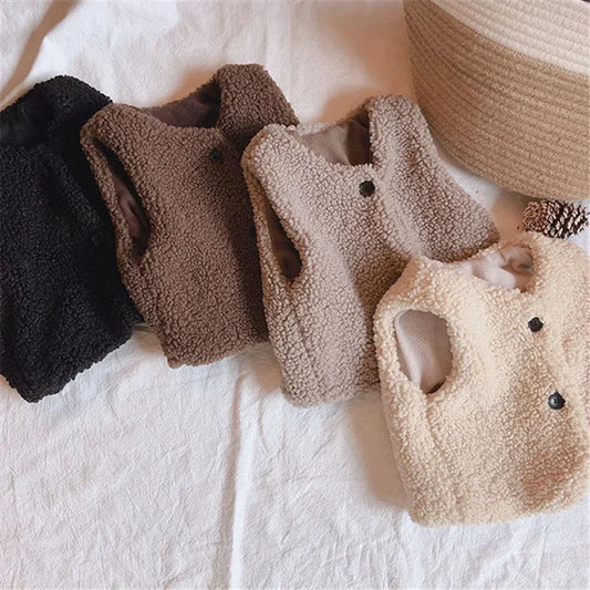 Otoño Invierno bebé lana de cordero más chaleco de terciopelo niñas niños chaleco de felpa de un solo pecho cuello en V niño cálido moda abrigo cálido