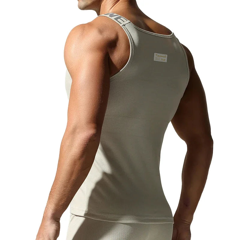 Camisetas sin mangas a la moda para hombre, chaleco deportivo de entrenamiento sin mangas, camisolas acanaladas con tirantes elásticos de Color sólido, camisetas interiores ajustadas