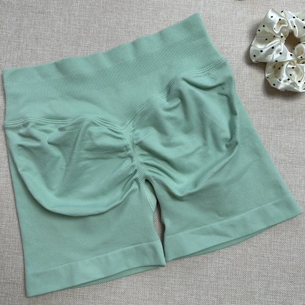 Pantalones cortos deportivos para mujer, pantalones cortos de gimnasio con banda baja acanalada de 4,5 ", mallas sin costuras para entrenamiento y Yoga