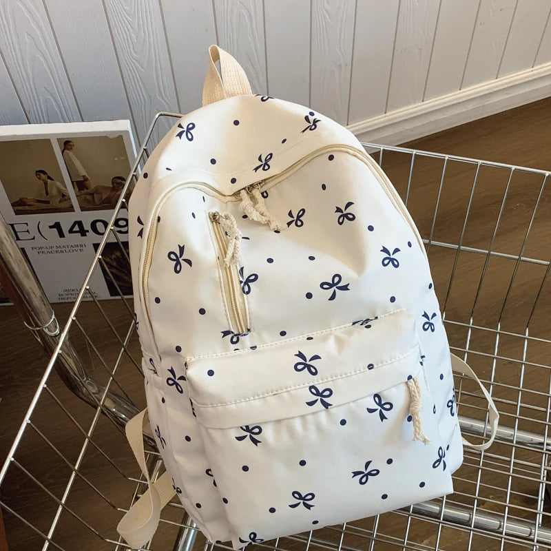 Para uso diario, temporada de regreso a la escuela, mochila acolchada con estampado de lazos divertidos, con múltiples bolsillos, correas ajustables, gran capacidad