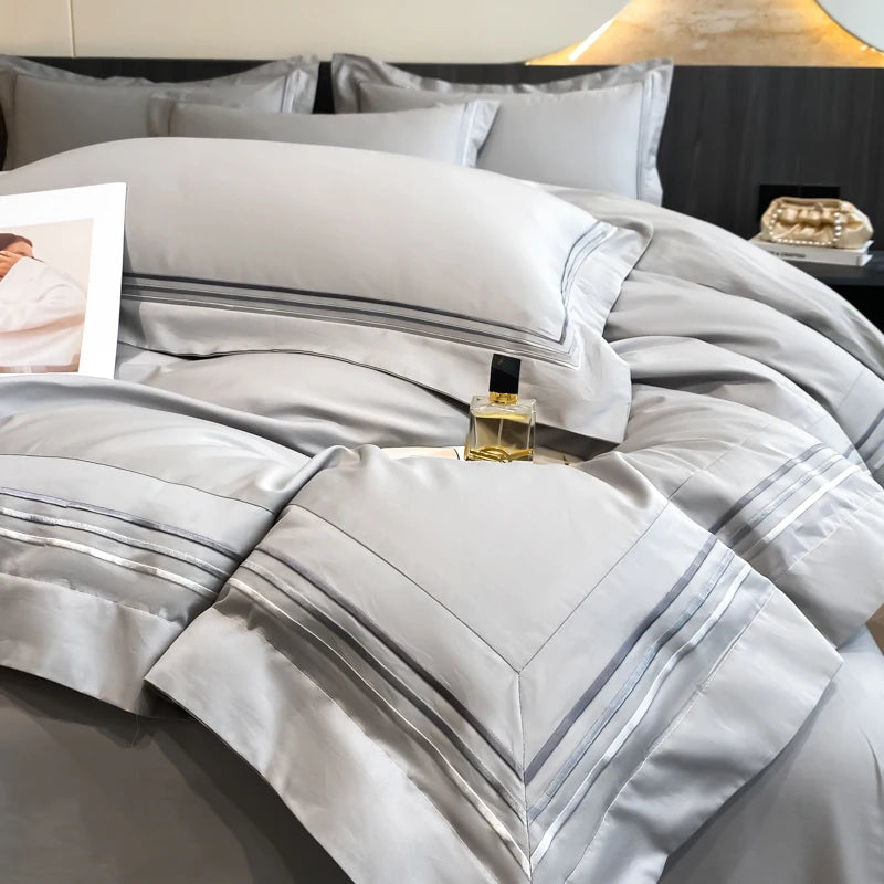 Juego de ropa de cama de lujo para Hotel, funda de edredón con bordado de Color sólido, Sábana plana/ajustada, fundas de almohada, tamaño Queen y King, 100% algodón