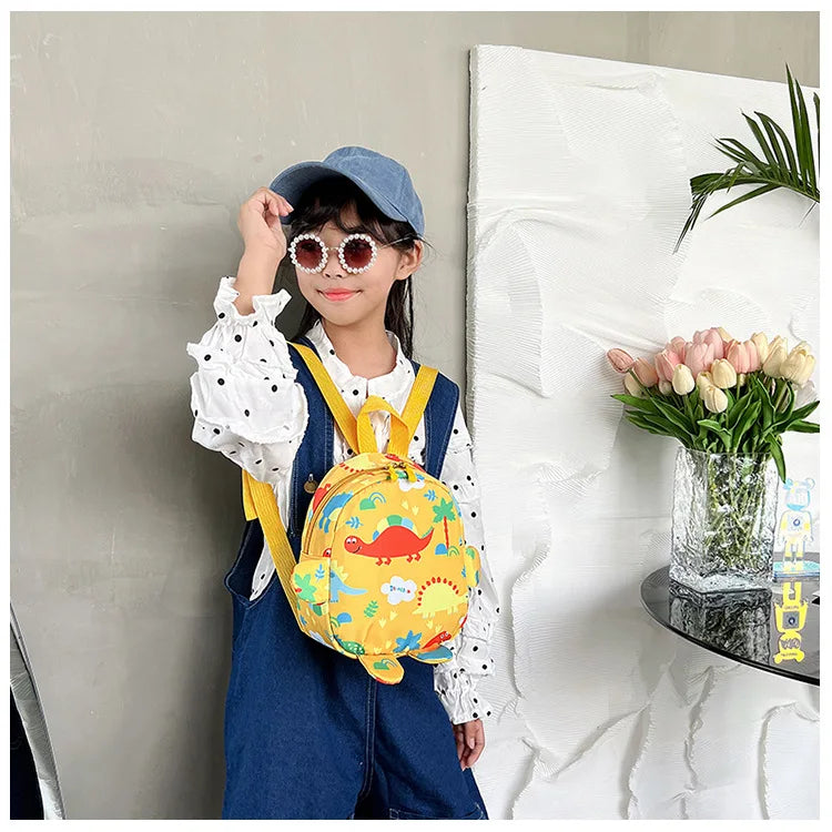 Bolsa bonita para niños, mochilas escolares con dibujos de dinosaurios para niños, mochila de viaje para exteriores preescolar para guardería, antipérdida